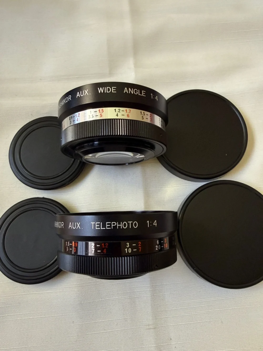 Set of 2 VTG Yashica Yashikor aux Telephoto & Wide Angle 1:4 Lens with cups